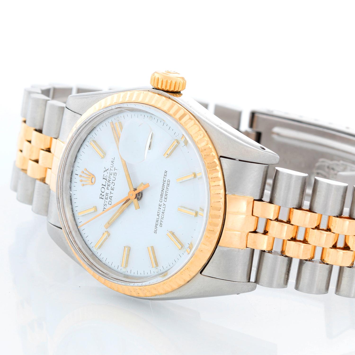 Men's Rolex Datejust 2-Tone Watch 16013 - Automatic winding, 27 jewels, Quickset, acrylic crystal. Stainless steel case with custom diamond bezel ( 36 mm ). White dial with stick hour markers . Rolex yellow gold and stainless steel Jubilee bracelet.