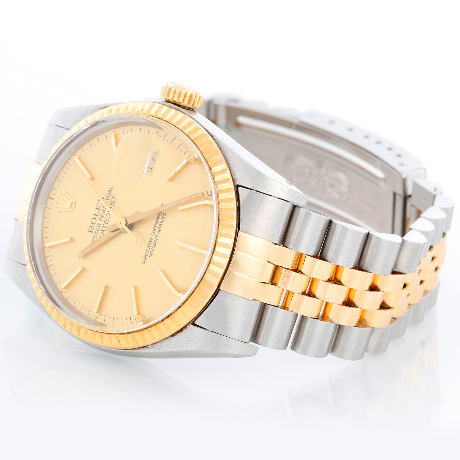 Men's Rolex Datejust 2-Tone Watch 16013 - Automatic winding, 27 jewels, Quickset, acrylic crystal. Stainless steel case with fluted bezel ( 36 mm ). Champagne dial with stick hour markers. Two-tone jubilee bracelet . Pre-owned with custom box.