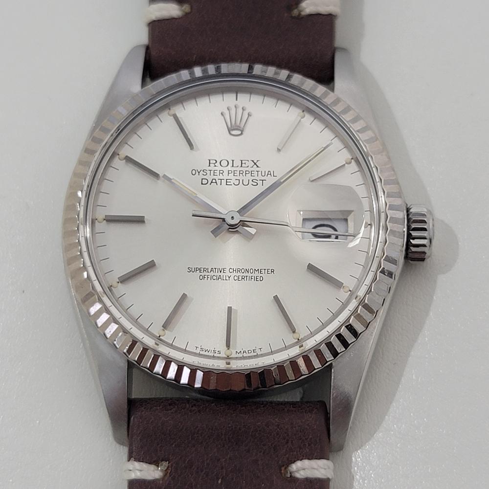Timeless icon, Men's 18k white gold and stainless steel Rolex's Oyster Perpetual Datejust Ref.16014 automatic, c.1985, in excellent working condition. Verified authentic by a master watchmaker. Gorgeous Rolex signed silver dial, applied baton index