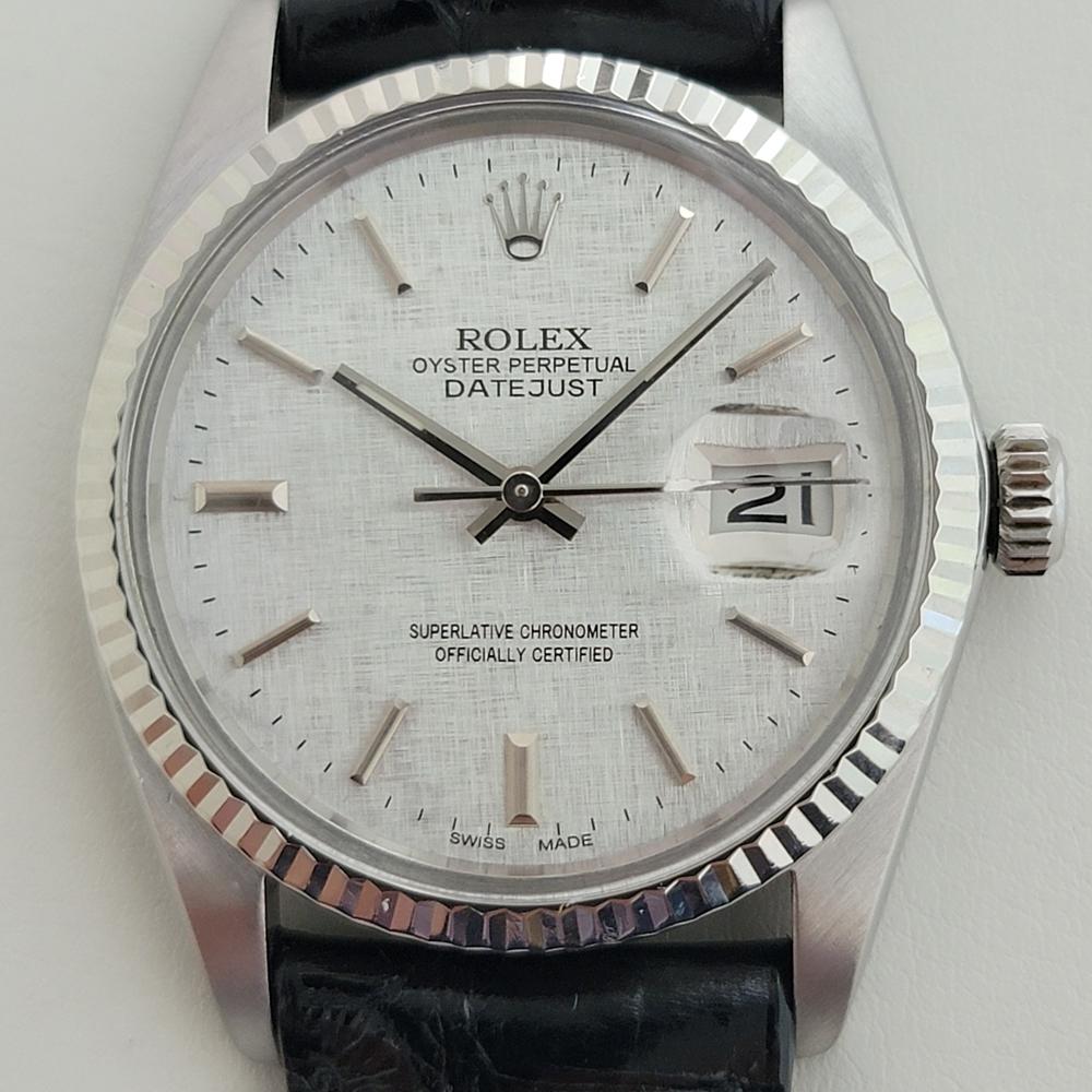 Timeless icon, Men's 18k white gold and stainless steel Rolex Oyster Perpetual Datejust Ref.16014 automatic, c.1983, all original, in excellent working condition. Verified authentic by a master watchmaker. Gorgeous Rolex signed silver linen dial,