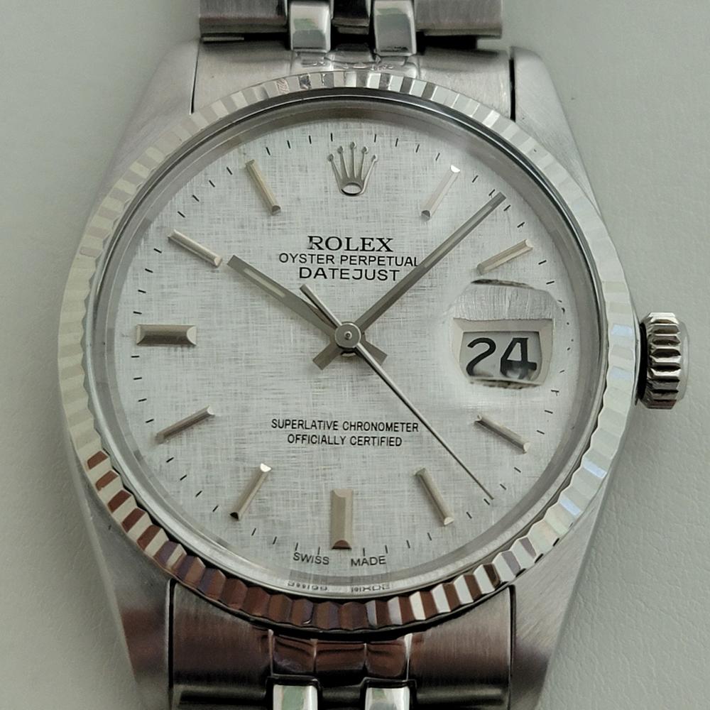 Timeless icon, Men's 18k white gold and stainless steel Rolex Oyster Perpetual Datejust Ref.16014 automatic, c.1983, all original, in excellent working condition. Verified authentic by a master watchmaker. Gorgeous Rolex signed silver linen dial,