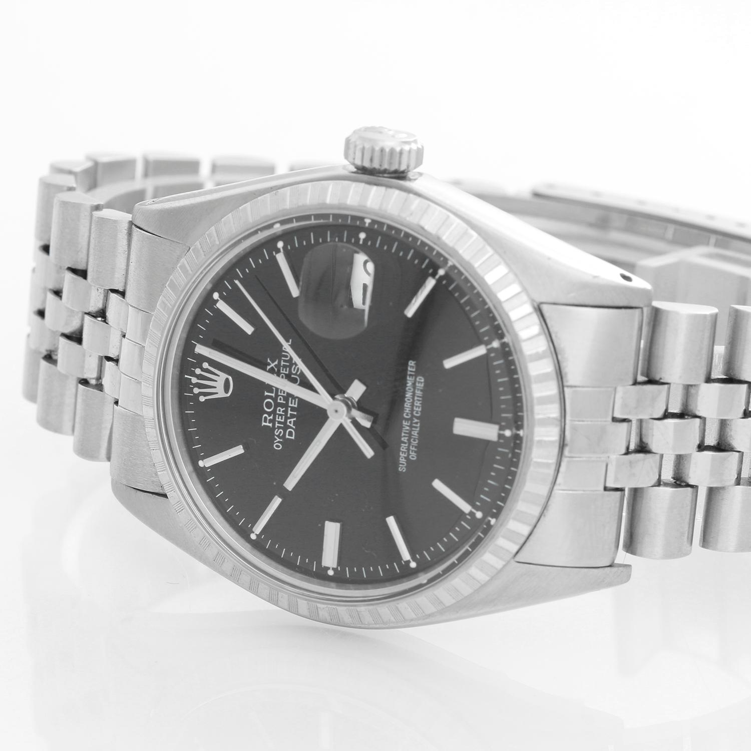 Men's Rolex Datejust Stainless Steel Watch 1601 - Automatic winding,. Stainless steel case with engine turned bezel ( 36 mm ) . Black dial with stick hour markers. Stainless steel jubilee bracelet . Pre-owned wtih box and books. 