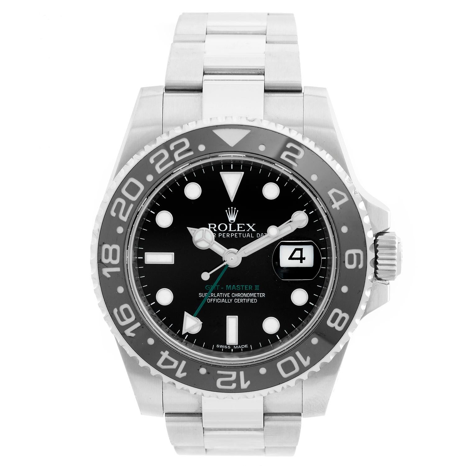 Men's Rolex GMT-Master II Watch 116710LN - Automatic winding, 31 jewels. Stainless steel case with 24 hour ceramic bezel . Black dial with luminous markers; green GMT hand. Stainless steel Oyster bracelet with flip-lock clasp; extra green rubber