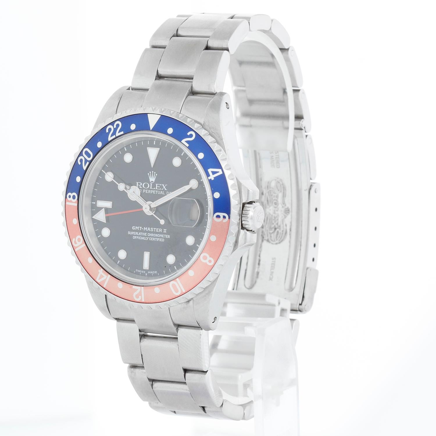 Men's Rolex GMT - Master II Watch 16710 Pepsi Rotating Bezel - Automatic winding, 31 jewels, Quickset, sapphire crystal. Stainless steel case and rotating bezel with red and blue insert ( 40 mm ) . Black dial with luminous type markers. Stainless