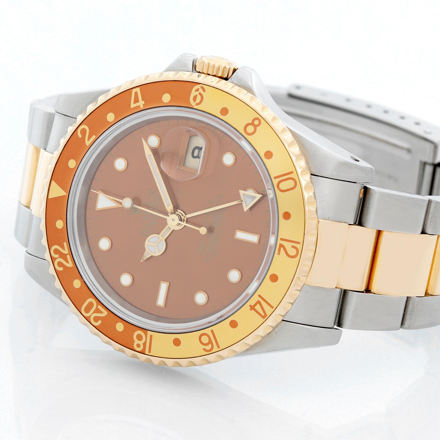 Men's Rolex GMT-Master II Watch 16713 - Automatic winding, 31 jewels, Quickset, sapphire crystal. Stainless steel with 18k yellow gold bezel with brown and gold insert. Brown dial with luminous style markers. Stainless steel & 18k yellow gold Oyster