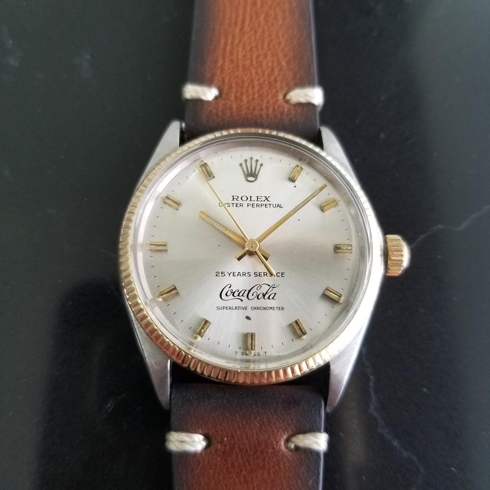 Classic icon, Men's 14K gold & stainless steel Rolex Oyster Perpetual Ref.1005 Coca-Cola dial automatic, c.1971. Verified authentic by a master watchmaker. Original Rolex signed silver Coca-Cola dial commemorating 25 years of service, applied gold