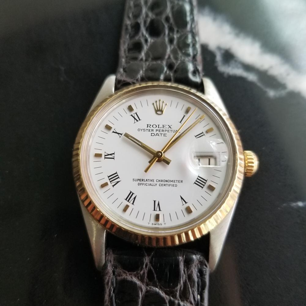 Luxurious classic, Men's Rolex 18K yellow gold and stainless steel Ref.15000 Oyster Perpetual Date, circa 1982. Verified authentic by a master watchmaker. Stunning Rolex-signed polar white dial with applied gold block and black Roman numeral hour