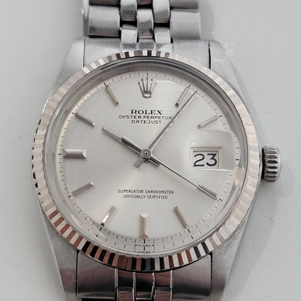 Timeless icon, Men's Rolex 1601 Oyster Datejust automatic,  18k white gold bezel, c.1976, all original. Verified authentic by a master watchmaker. Gorgeous, unrefurbished Rolex signed silver dial, applied indice hour markers, silver minute and hour