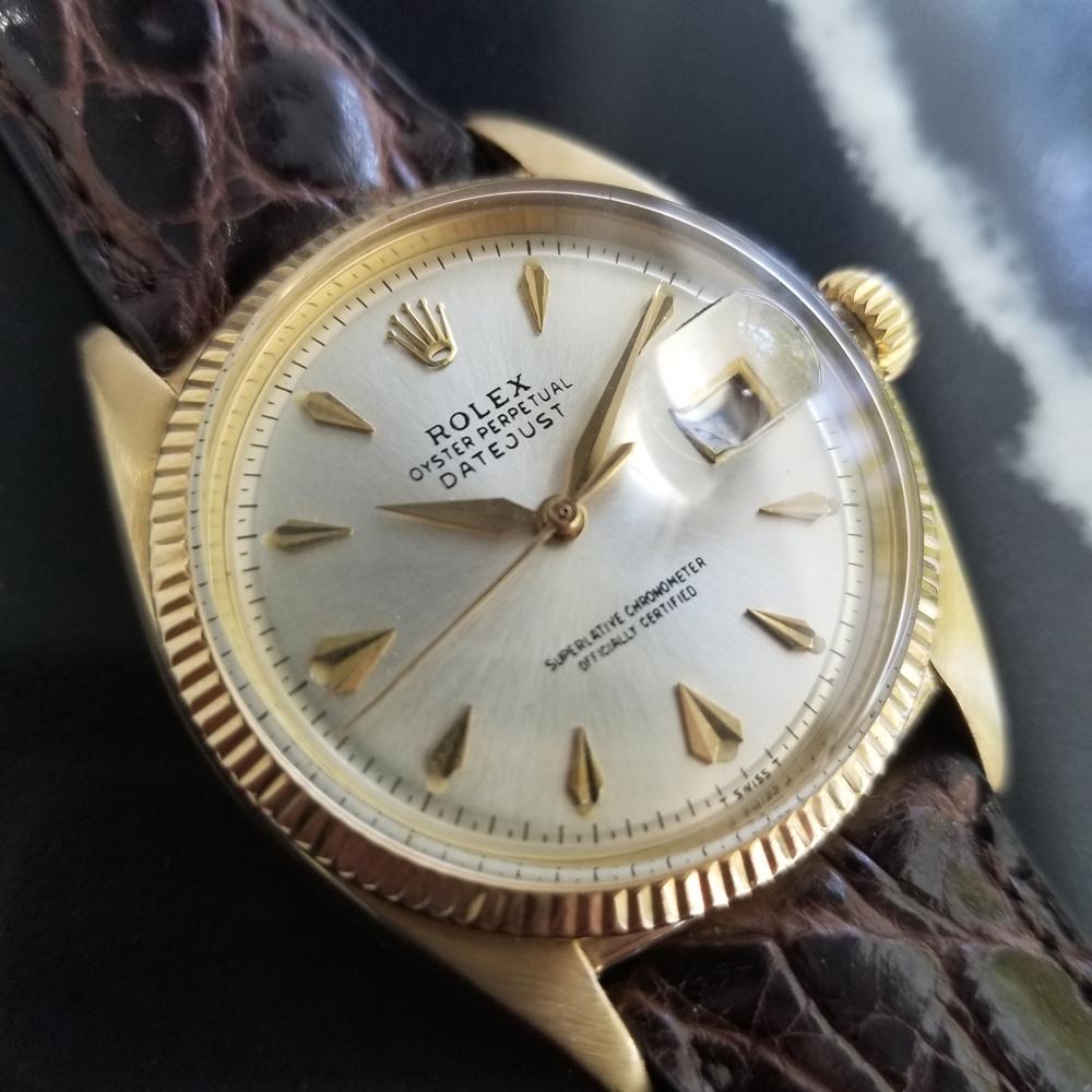 Luxurious icon, Men's 14k solid gold Rolex ref.6605 Oyster Datejust automatic, c.1957. Verified authentic by a master watchmaker. Gorgeous Rolex signed silver dial, applied sword hour markers, gilt lumed minute and hour hands, sweeping central