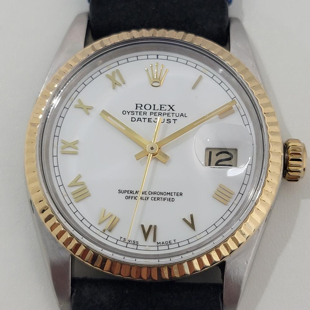 Iconic classic, Men's 18k gold and stainless steel Rolex Oyster Perpetual Datejust Ref.16013 automatic, c.1984, in excellent working condition. Verified authentic by a master watchmaker. Gorgeous Rolex signed white dial, applied gold Roman numeral
