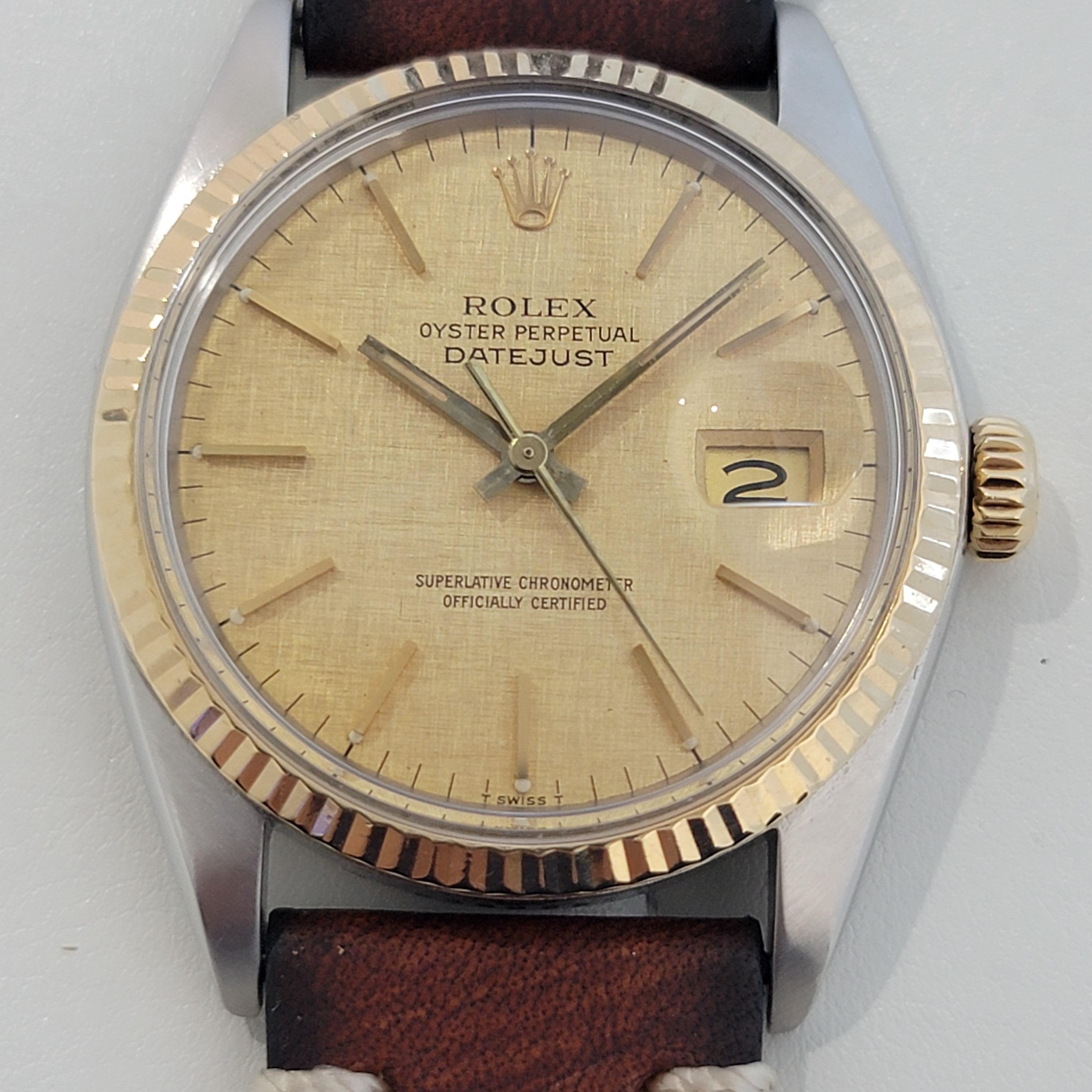 Iconic classic, Men's 18k gold and stainless steel Rolex Oyster Perpetual Datejust Ref.16013 automatic, c.1987, with iconic Rolex linen dial, in excellent working condition. Verified authentic by a master watchmaker. Gorgeous Rolex signed gold linen