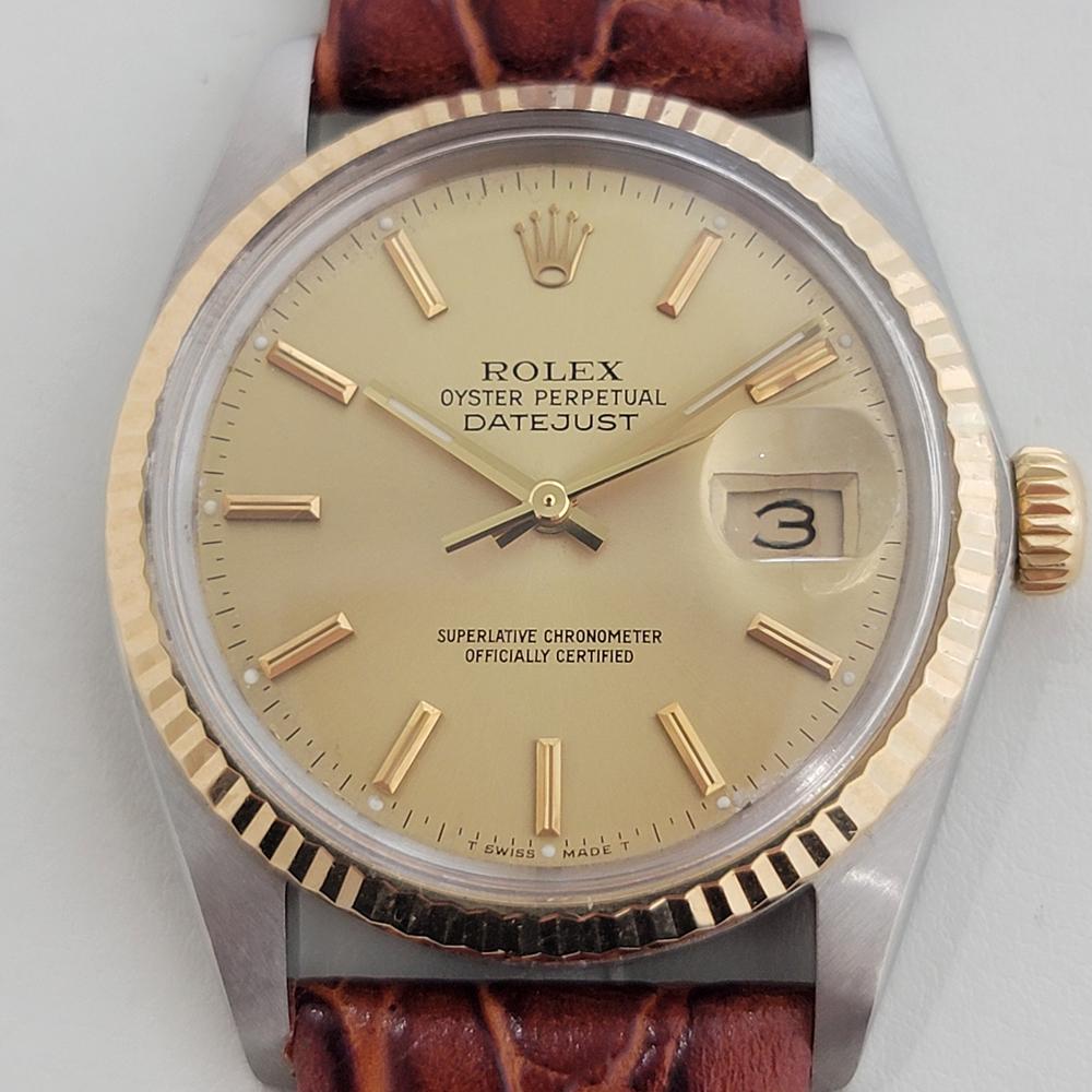 Iconic classic, Men's 18k gold and stainless steel Rolex Oyster Perpetual Datejust Ref.16013 automatic, c.1987, in excellent aesthetic and working condition. Verified authentic by a master watchmaker. Gorgeous Rolex signed gold dial, applied indice