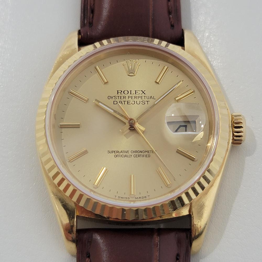 Timeless luxury, Men's 18k solid gold Rolex Oyster Perpetual Datejust Ref.16018 automatic, c.1983. Verified authentic by a master watchmaker. Gorgeous Rolex signed white dial, applied gilt Roman numeral hour markers, gilt minute and hour hands,