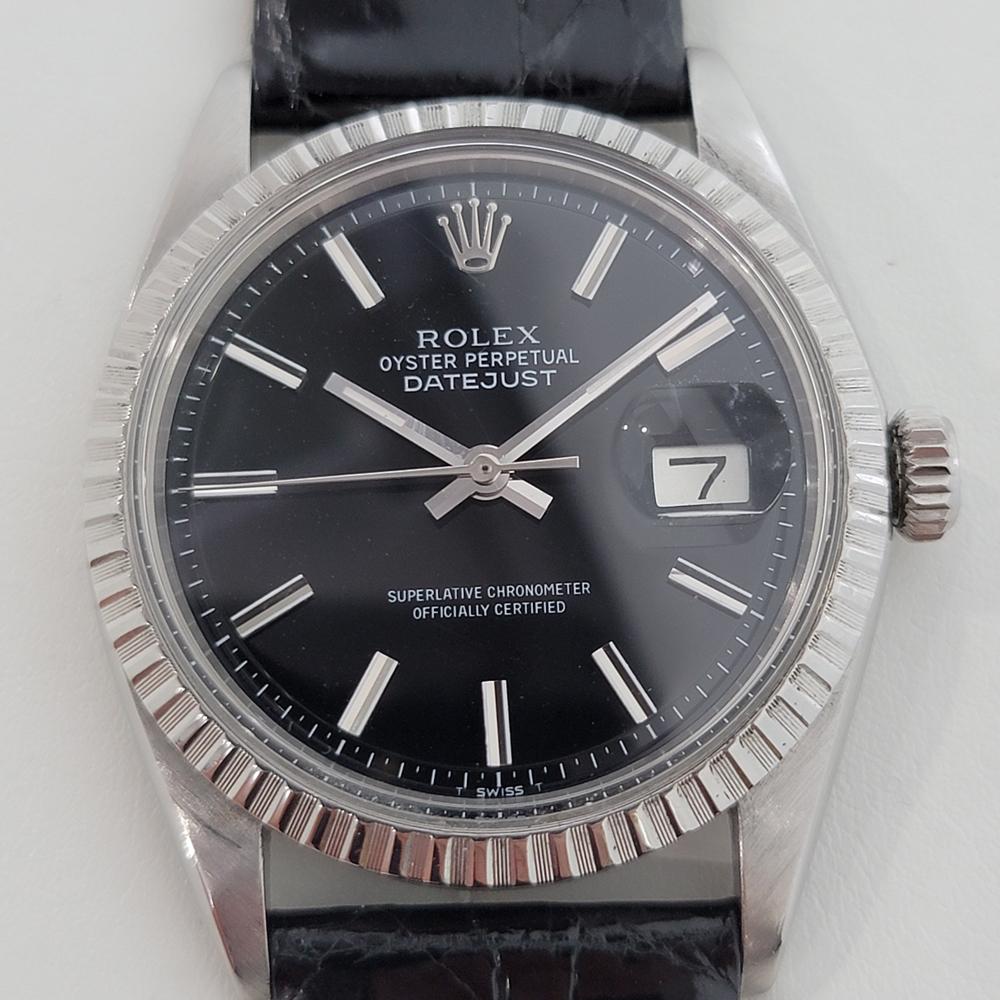 Iconic classic, Men's Rolex Oyster Datejust ref.1603 automatic, c.1974. Verified authentic by a master watchmaker. Gorgeous Rolex signed black dial, applied indice hour markers, silver minute and hour hands, sweeping central second hand, date