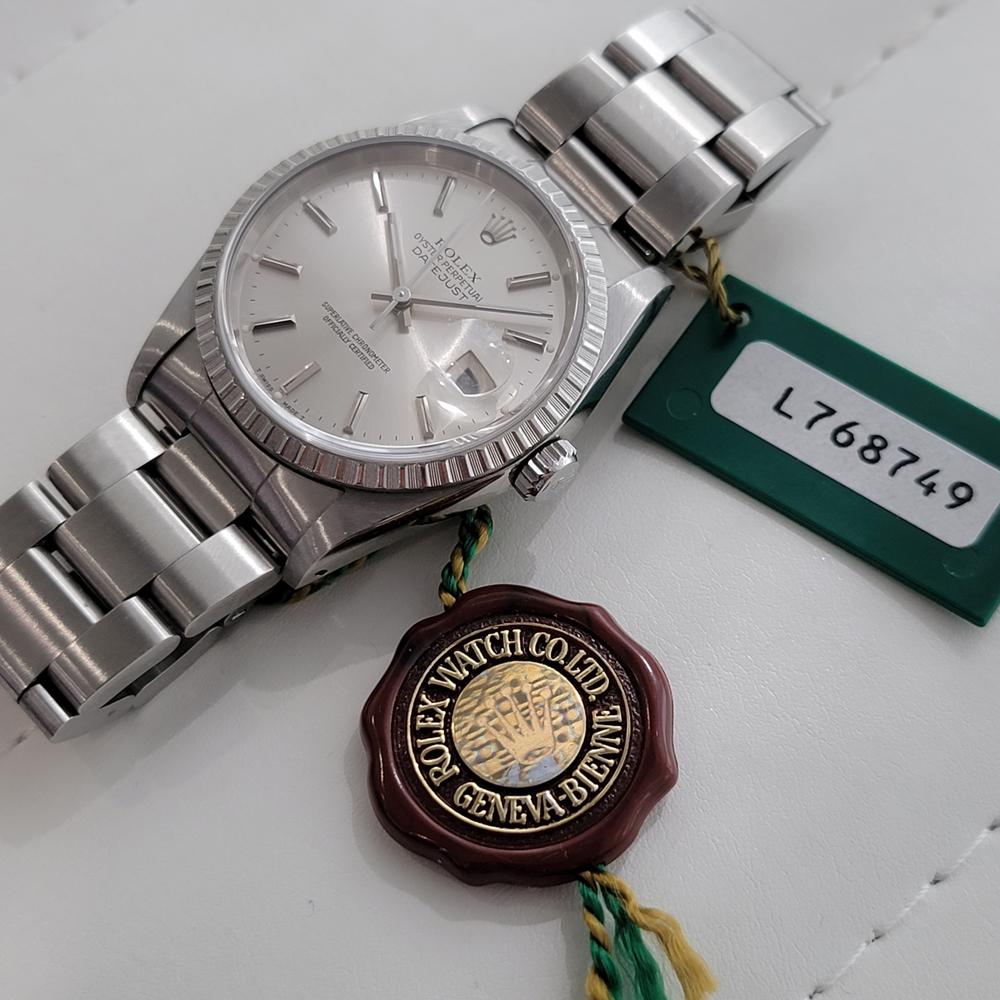Timeless classic, complete with box and papers, original tags, price tag and cloth!  In like new condition, Men's all-stainless steel Rolex Oyster Datejust ref.16220 automatic, c.1989, all original with original box, booklet and papers. Verified