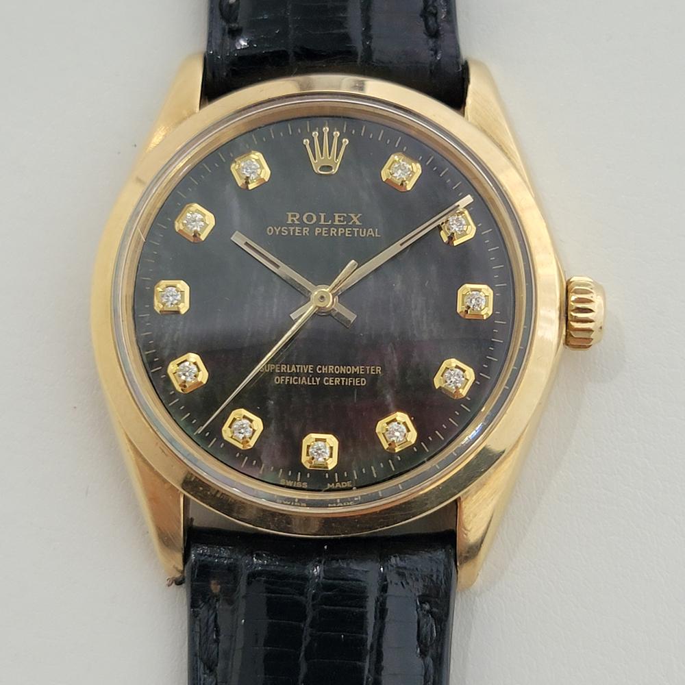 Dazzling classic, Men's 18k solid gold Rolex Ref.1002 Oyster perpetual automatic with mother of pearl diamond dial, c.1960s, in excellent vintage condition. Verified authentic by a master watchmaker. Stunning Rolex signed mother of pearl dial,