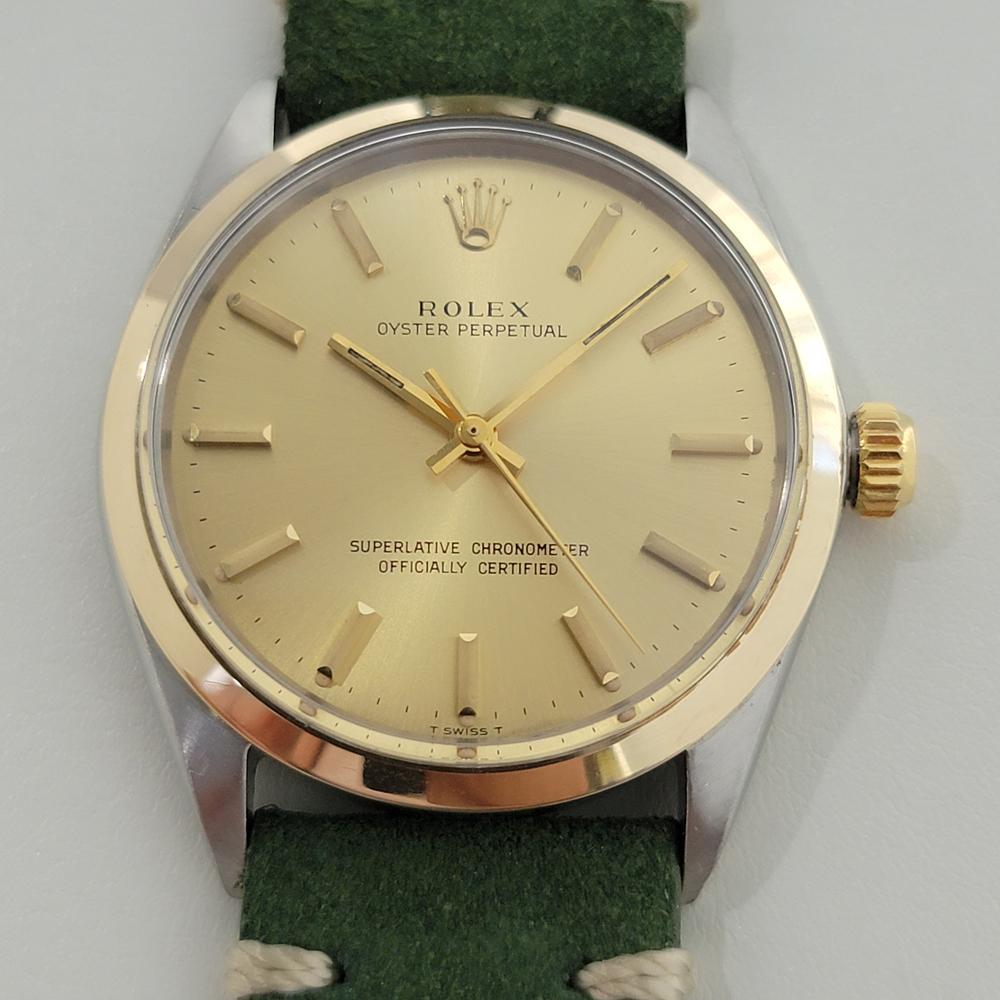 Elegant classic, Men's Rolex Oyster perpetual 1002 automatic dress watch, c.1969. Verified authentic by a master watchmaker. Gorgeous Rolex signed gold dial, applied indice hour markers, gilt minute and hour hands, sweeping central second hand,