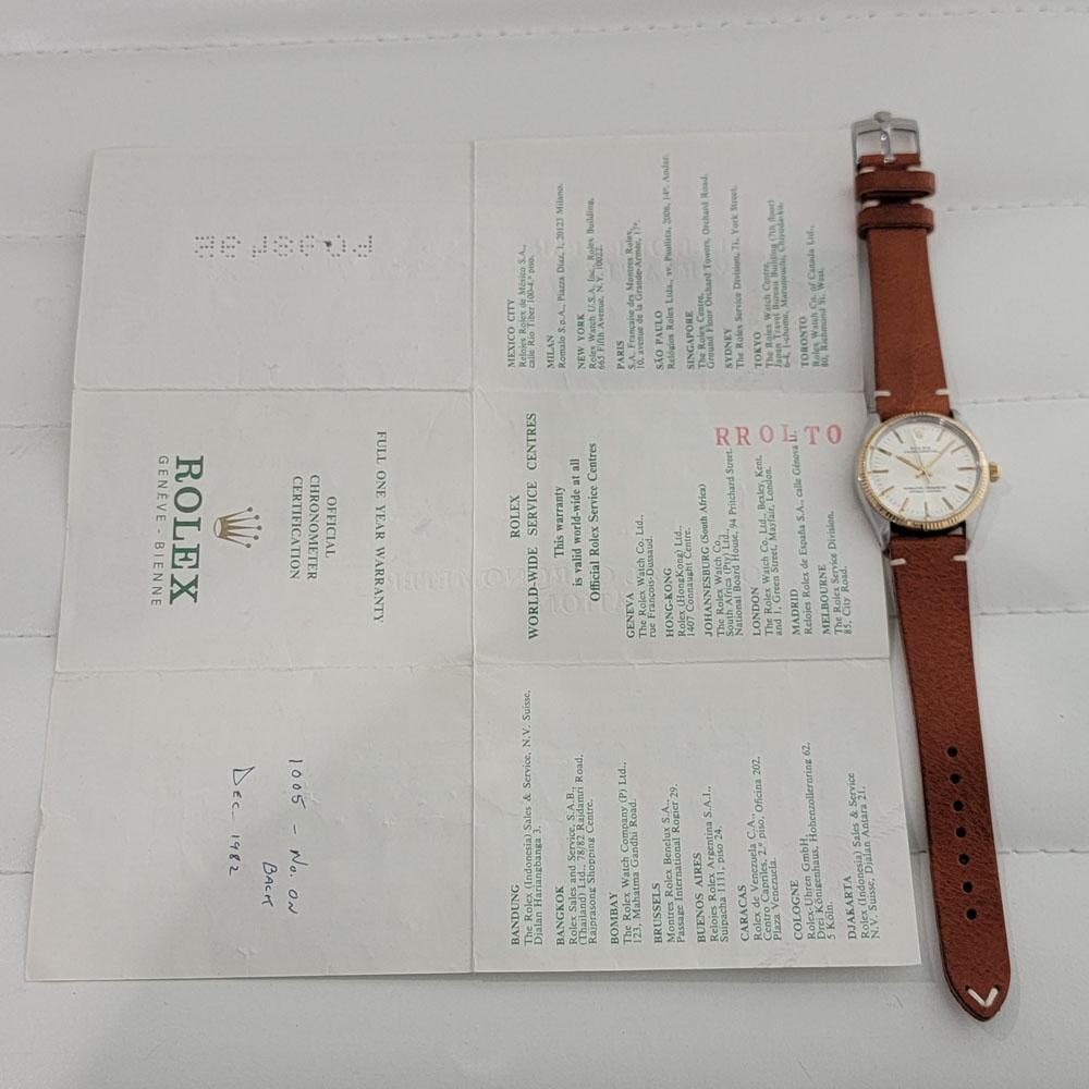 Rolex Oyster Perpetual 1005 Oro 14k SS Automatico 1970s con documenti RA181T 10