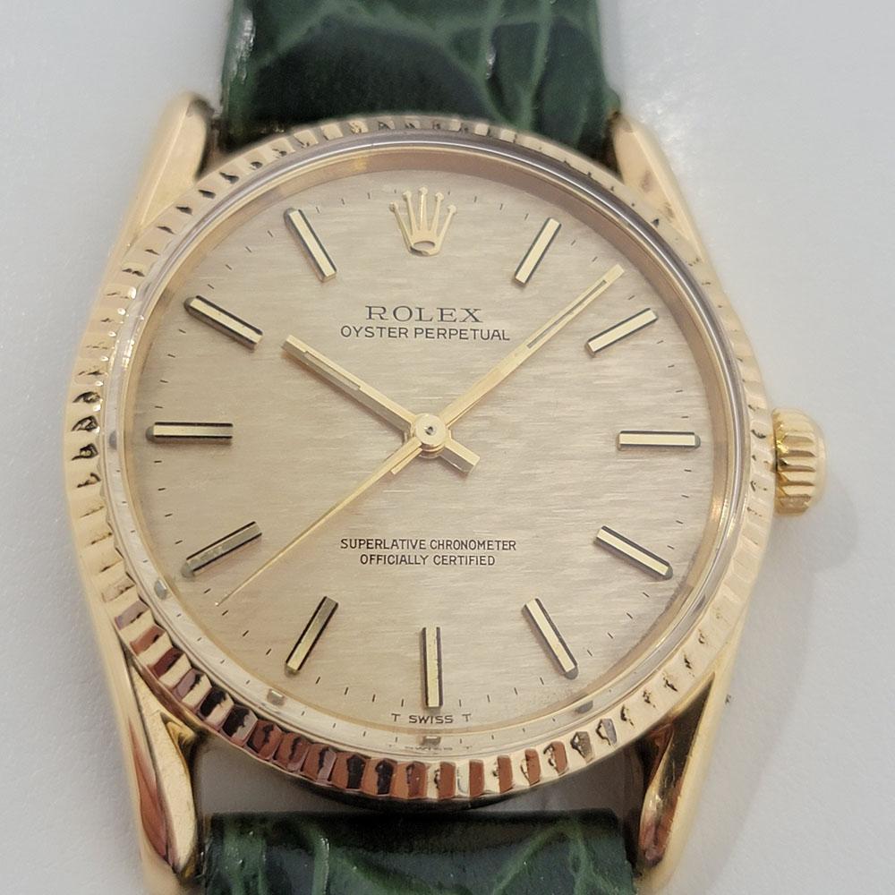 Timeless luxury, Men's Rolex 18k solid gold Oyster Perpetual Ref.1011 automatic, c.1970s. Verified authentic by a master watchmaker. Gorgeous Rolex signed gold textured dial, applied gold baton hour markers, gilt minute and hour hands, sweeping