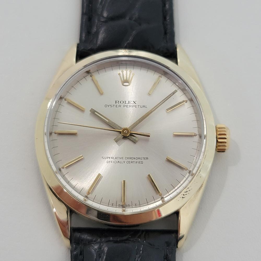 Charming classic, Men's Rolex 1024 Oyster perpetual automatic dress watch, c.1960s. Verified authentic by a master watchmaker. Gorgeous Rolex signed silver dial, applied indice hour markers, gilt minute and hour hands, sweeping central second hand,