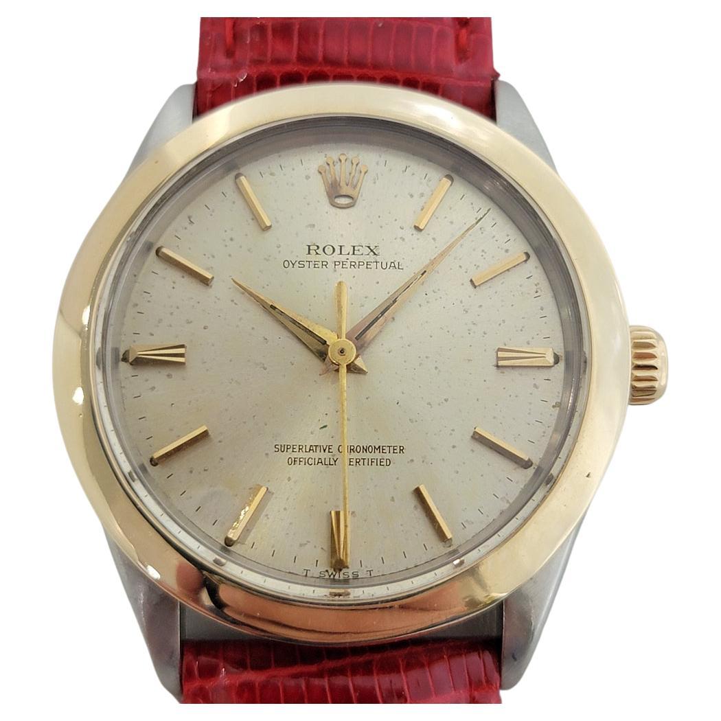 Iconic classic, Men's 14K gold & stainless steel Rolex Oyster Perpetual Ref.1005 automatic, c.1964. Verified authentic by a master watchmaker. Gorgeous, unrefurbished Rolex signed champagne dial, applied gold baton hour markers, gilt minute and hour