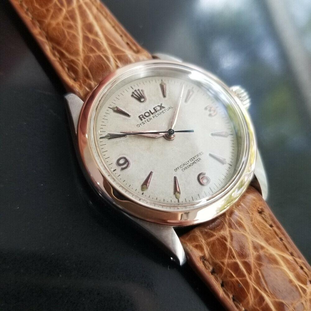 Luxurious icon, Men's Rolex 18k rose gold & stainless steel Oyster Perpetual Ref.6285 automatic dress watch, c.1954. Verified authentic by a master watchmaker. Gorgeous Rolex signed original vintage dial, applied arrowhead and Arabic numeral 3, 6, 9
