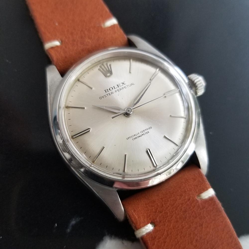 A rare timeless classic, Men's Rolex ref.6564 Oyster Perpetual automatic dress watch, c.1958. Verified authentic by a master watchmaker. Gorgeous Rolex signed silver dial, applied indice hour markers, silver lumed minute and hour hands, sweeping