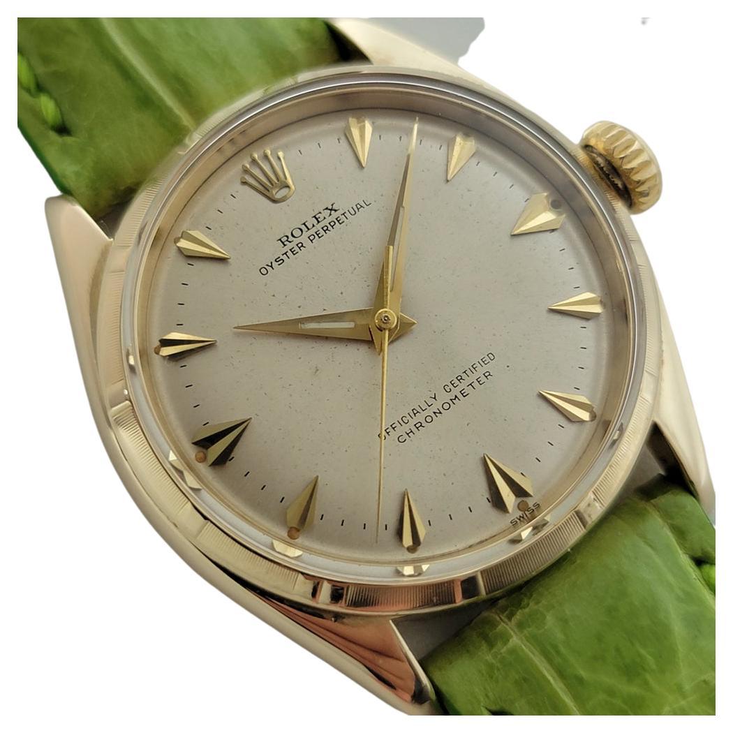 Timeless icon, Men's Rolex Oyster Perpetual ref.6585 solid 14k gold automatic, c.1960s. Verified authentic by a master watchmaker. Gorgeous, original, unrefurbished Rolex signed gold dial, applied faceted arrowhead hour markers, gilt minute and hour