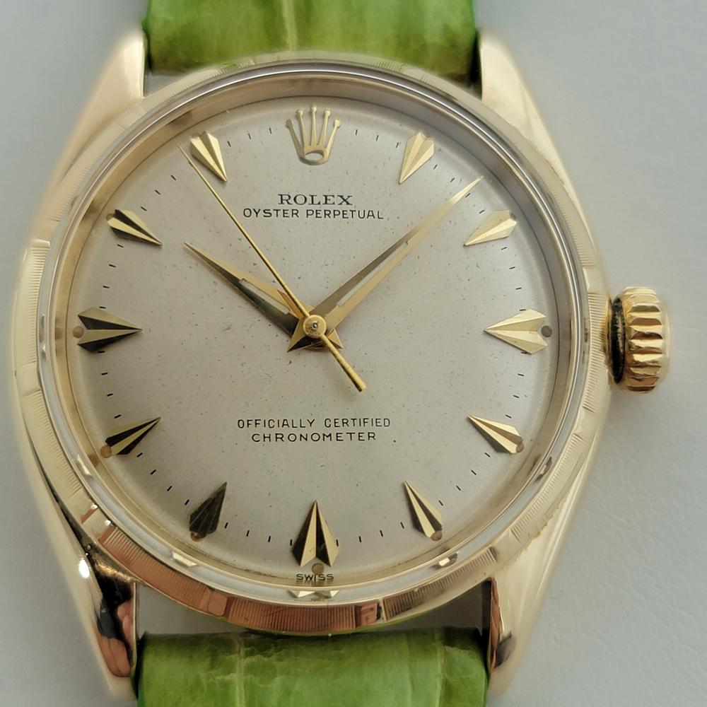 Timeless icon, Men's Rolex Oyster Perpetual ref.6585 solid 14k gold automatic, c.1960s. Verified authentic by a master watchmaker. Gorgeous, original, unrefurbished Rolex signed gold dial, applied faceted arrowhead hour markers, gilt minute and hour
