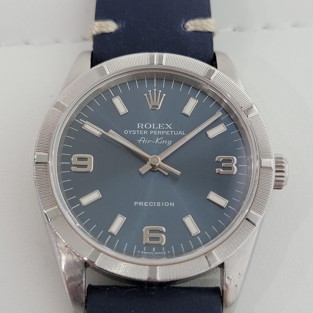 Stunning icon, Men's Rolex Oyster Perpetual Air-King 14000 Precision automatic, c.1999. Verified authentic by a master watchmaker. Gorgeous Rolex signed blue dial, applied indice and Arabic numeral 3, 6, 9 hour markers, lumed minute and hour hands,