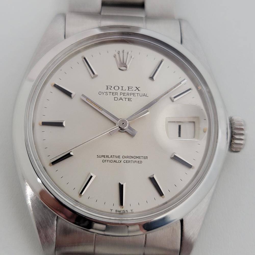 Timeless classic, Men's Rolex Oyster Perpetual Date 1500 automatic, c.1969, all original, with original paper. Verified authentic by a master watchmaker. Gorgeous Rolex signed silver dial, applied silver indice hour markers, silver minute and hour