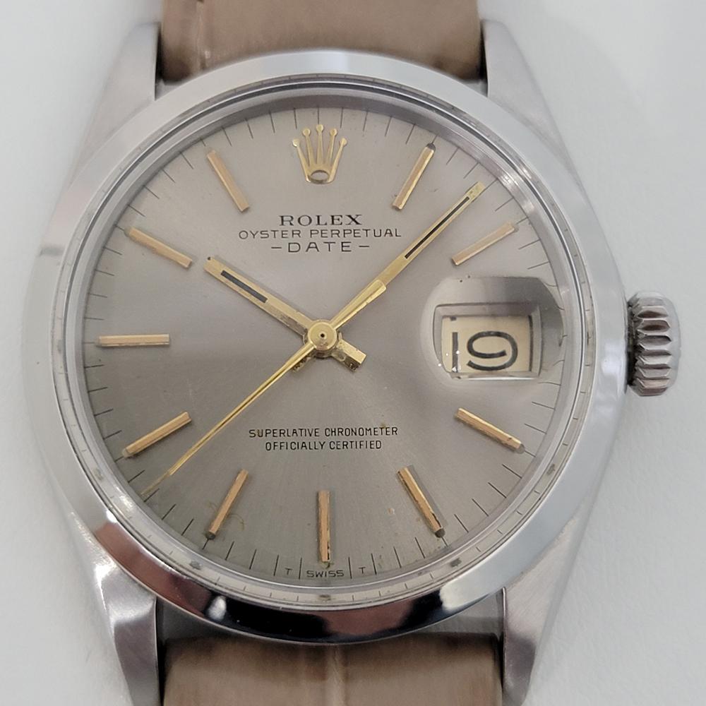 Timeless classic, Men's Rolex Oyster Perpetual Date Ref.1500 automatic, c.1972, with Rolex pouch. Verified authentic by a master watchmaker. Gorgeous, unique Rolex signed smoke silver dial, applied silver index hour markers, gilt minute and hour