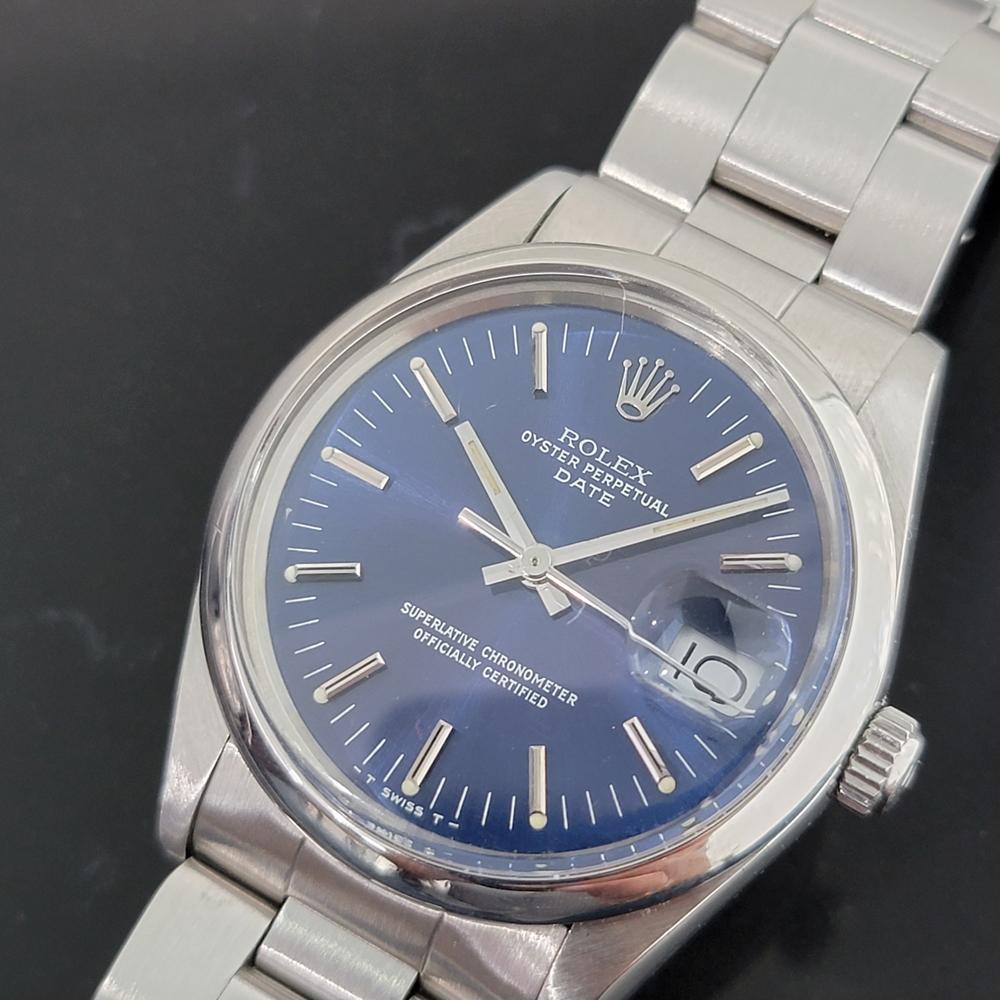 Iconic classic, Men's Rolex Oyster Perpetual Date 15000 automatic, c.1982, all original. Verified authentic by a master watchmaker. Stunning Rolex signed blue dial, applied silver indice hour markers, silver minute and hour hands, sweeping central