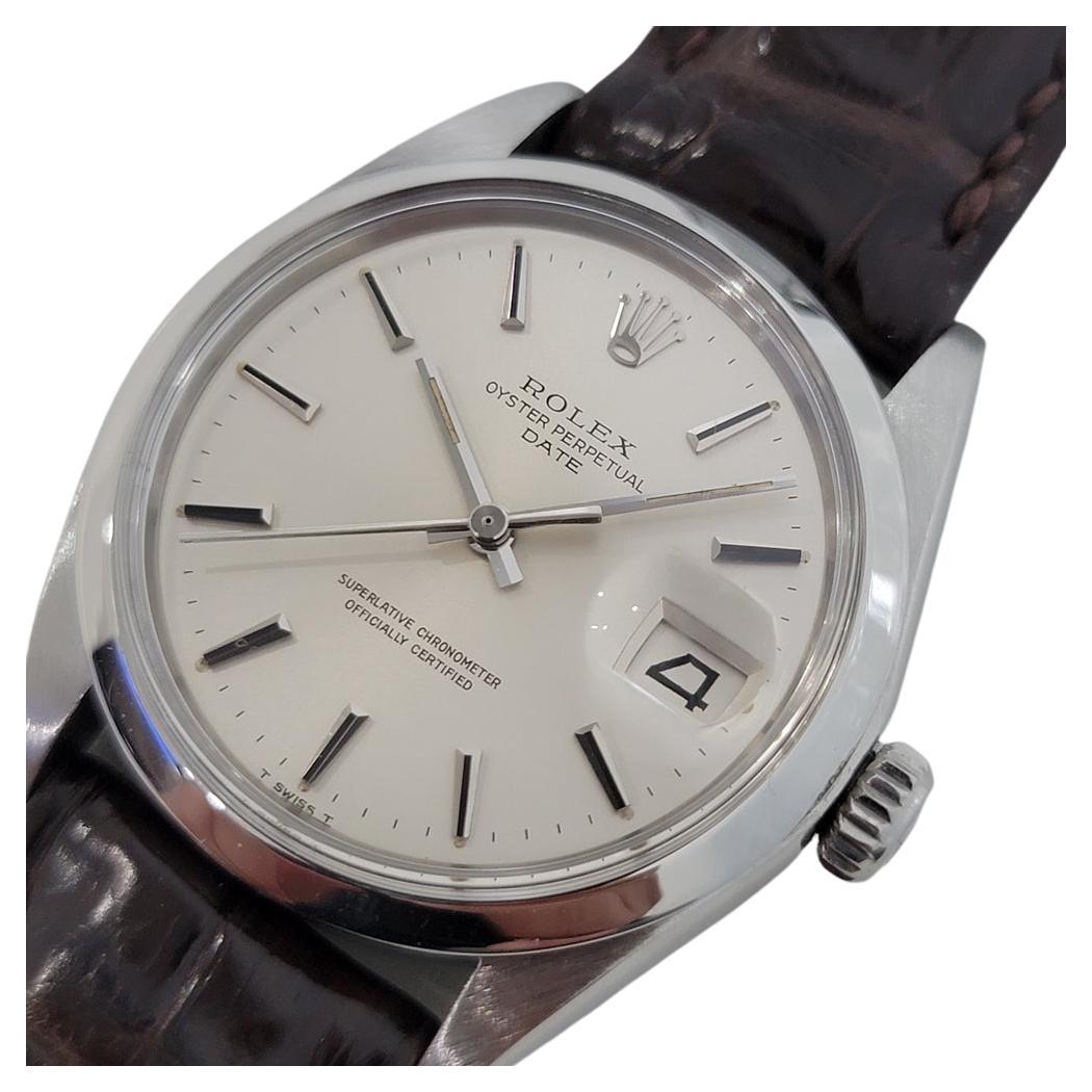 Timeless classic, Men's Rolex Oyster Perpetual Date 1500 automatic, c.1969, with original paper and original stainless steel bracelet. Verified authentic by a master watchmaker. Gorgeous Rolex signed silver dial, applied silver indice hour markers,