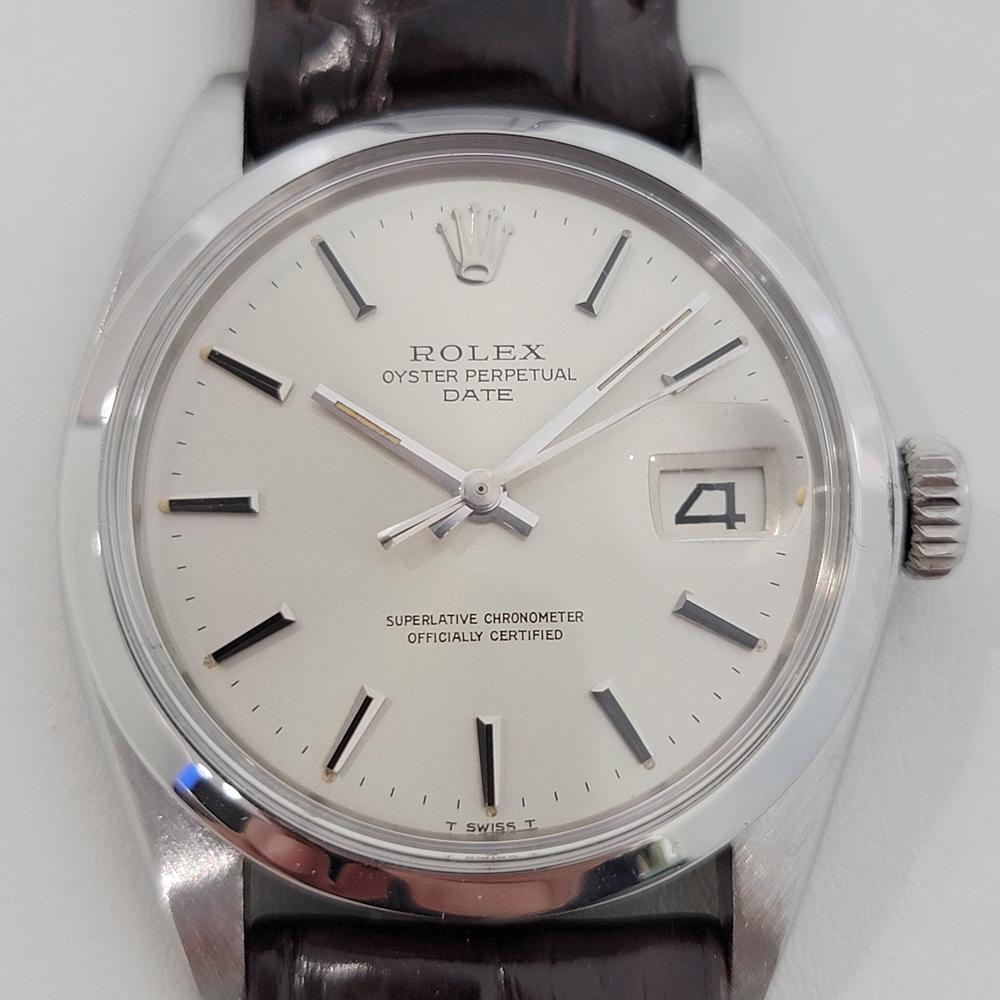 Timeless classic, Men's Rolex Oyster Perpetual Date 1500 automatic, c.1969, with original paper and original stainless steel bracelet. Verified authentic by a master watchmaker. Gorgeous Rolex signed silver dial, applied silver indice hour markers,