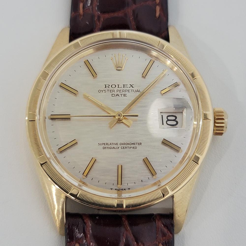 Timeless classic, Men's 14k solid gold Rolex Oyster Perpetual Date Ref.1501 automatic, c.1971. Verified authentic by a master watchmaker. Gorgeous Rolex signed silver textured dial, applied indice, gilt minute and hour hands, sweeping central second