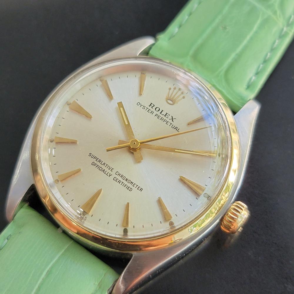 Timeless classic, Men's 14k gold & ss Rolex Oyster perpetual automatic dress watch, c.1961. Verified authentic by a master watchmaker. Gorgeous Rolex signed dial, applied arrowhead hour markers, gilt minute and hour hands, sweeping central second