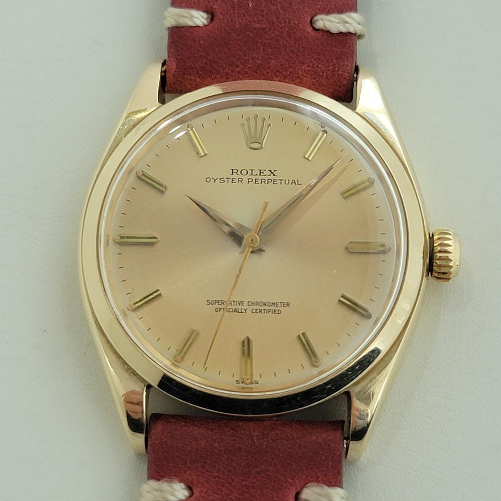 Luxurious vintage classic, Men's 14k solid gold Rolex Oyster Precision ref.1002 automatic, c.1961, in excellent working condition. Verified authentic by a master watchmaker. Gorgeous, Rolex signed dial, applied indice baton hour markers, gilt minute