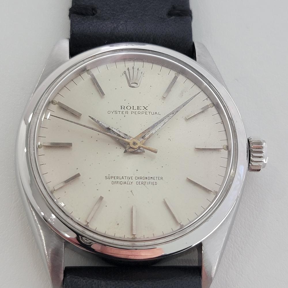 Timeless classic, Men's Rolex Ref.1002 Oyster perpetual automatic dress watch, c.1964. Verified authentic by a master watchmaker. Gorgeous Rolex signed silver dial, applied indice hour markers, gilt minute and hour hands, sweeping central second