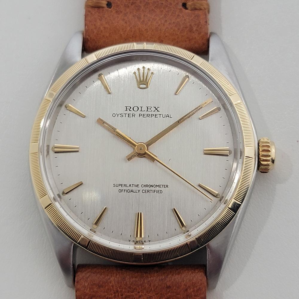 Vintage classic, Men's 14k gold and stainless steel Rolex Oyster Precision ref.1003 automatic, c.1966, in excellent working condition. Verified authentic by a master watchmaker. Gorgeous, Rolex signed dial, applied baton indice hour markers, gilt