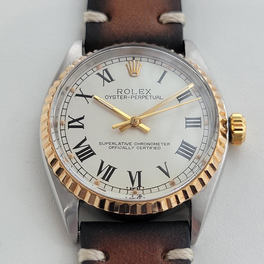 Iconic classic, Men's Rolex  solid 18k gold & stainless steel Oyster Perpetual automatic ref.1003, c.1960s. Verified authentic by a master watchmaker. Gorgeous Rolex signed dial, Roman numeral hour markers, gilt minute and hour hands, sweeping