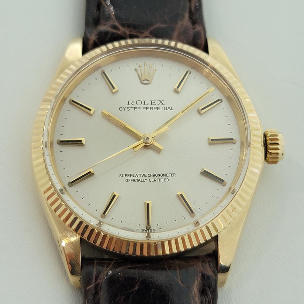 Luxurious classic, Men's 18K solid gold Rolex Oyster Perpetual Ref.1005 automatic, c.1969. Verified authentic by a master watchmaker. Gorgeous, Rolex signed dial, applied gold baton hour markers, gilt minute and hour hands, sweeping central second