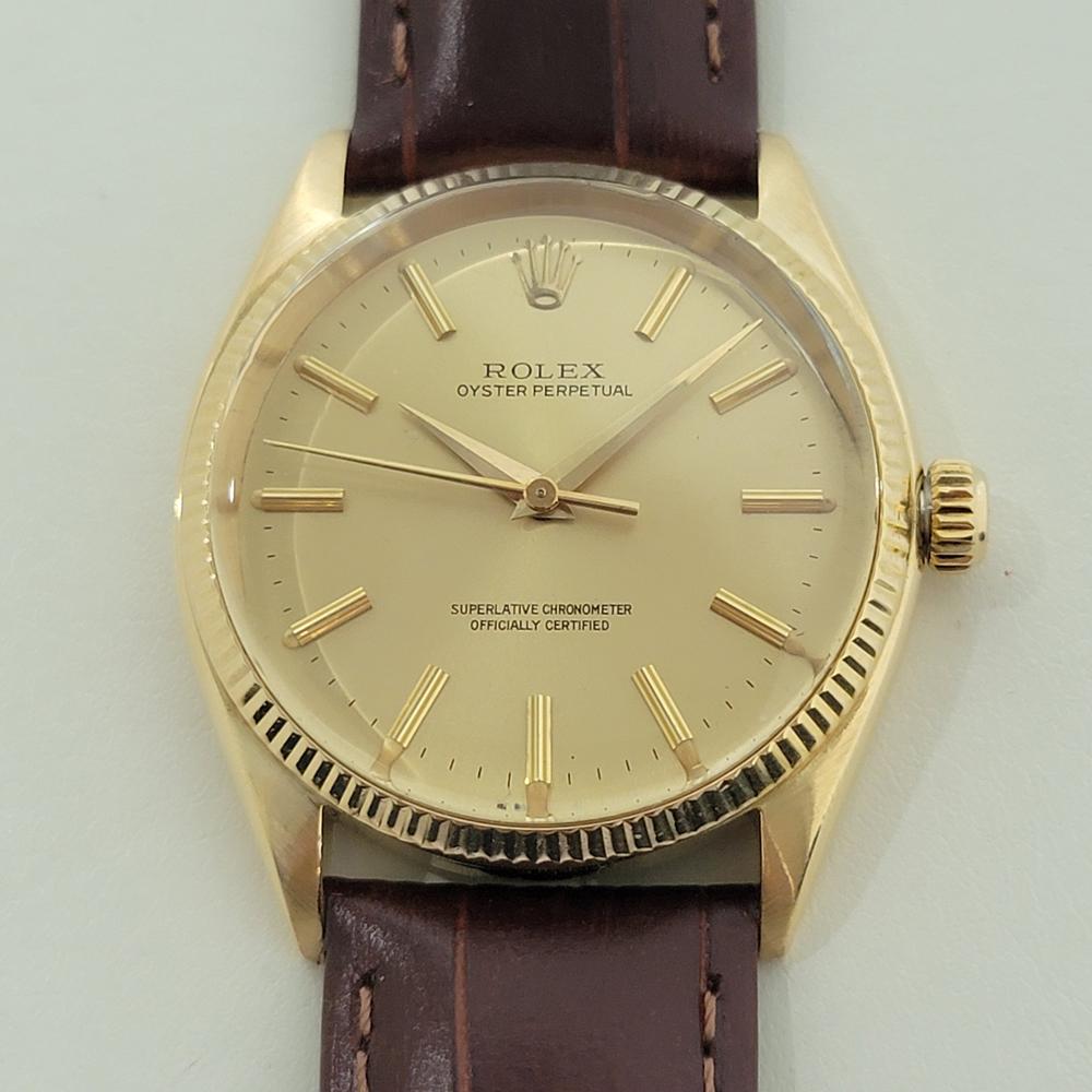 Elegant luxury, Men's 18k solid gold Rolex Oyster perpetual ref.1005 automatic, c.1960s, in excellent working and aesthetic condition. Verified authentic by a master watchmaker. Gorgeous, Rolex signed gold dial, applied index baton hour markers,