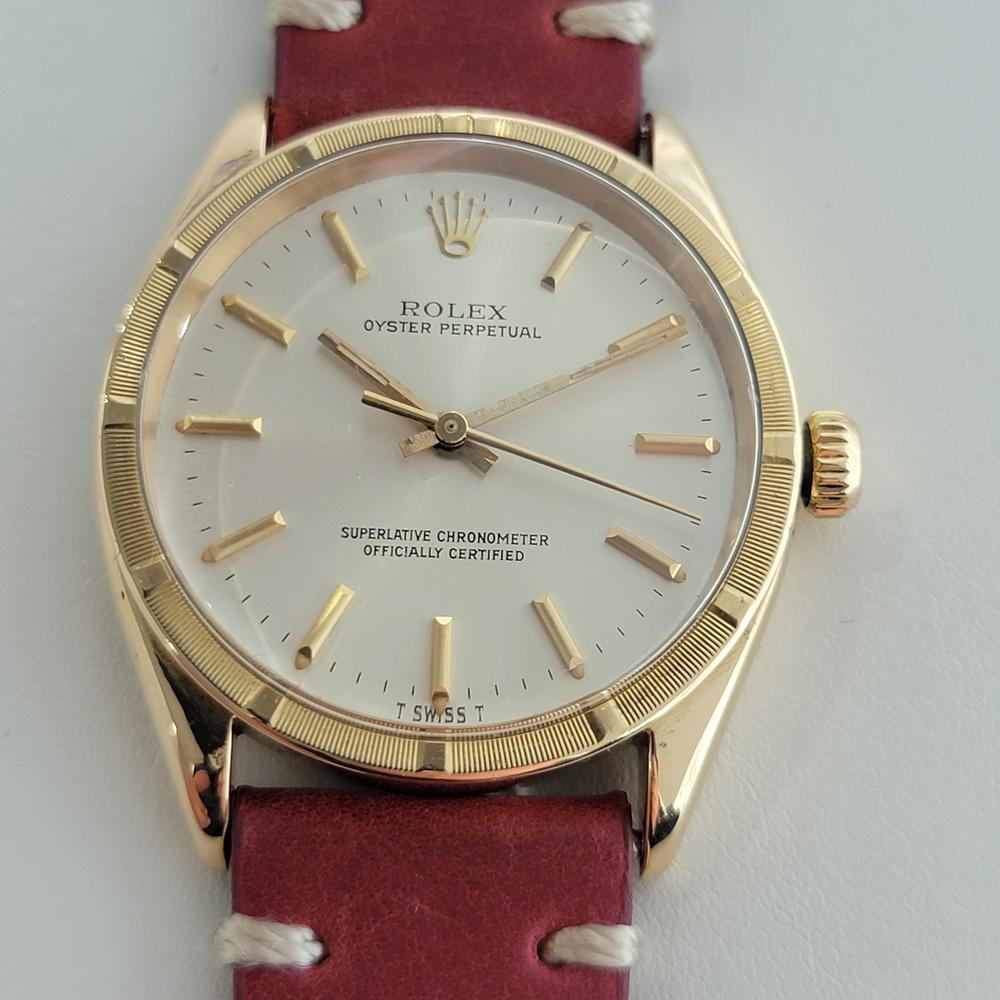 Iconic luxury, Men's solid 18K gold Rolex Ref.1007 Oyster perpetual automatic dress watch, c.1960. Verified authentic by a master watchmaker. Gorgeous Rolex signed dial, applied indice hour markers, gilt minute and hour hands, sweeping central