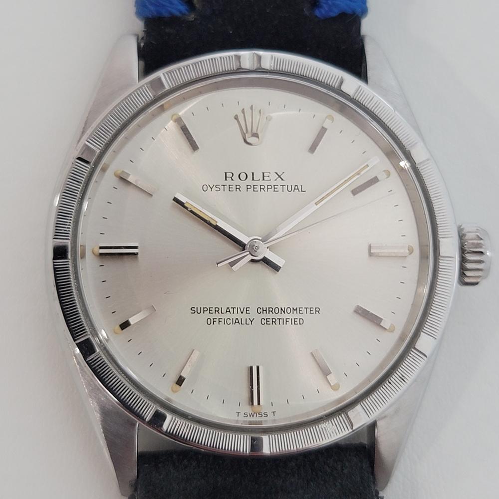 Timeless classic, Men's Rolex Ref.1007 Oyster perpetual automatic dress watch, c.1967. Verified authentic by a master watchmaker. Gorgeous Rolex signed silver dial, applied indice hour markers, silver minute and hour hands, sweeping central second