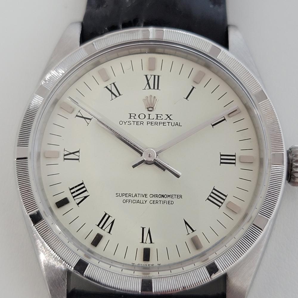 Timeless classic, Men's Rolex Ref.1007 Oyster perpetual automatic dress watch, c.1965. Verified authentic by a master watchmaker. Gorgeous Rolex signed silver dial, applied indice and black Roman numeral hour markers, silver minute and hour hands,