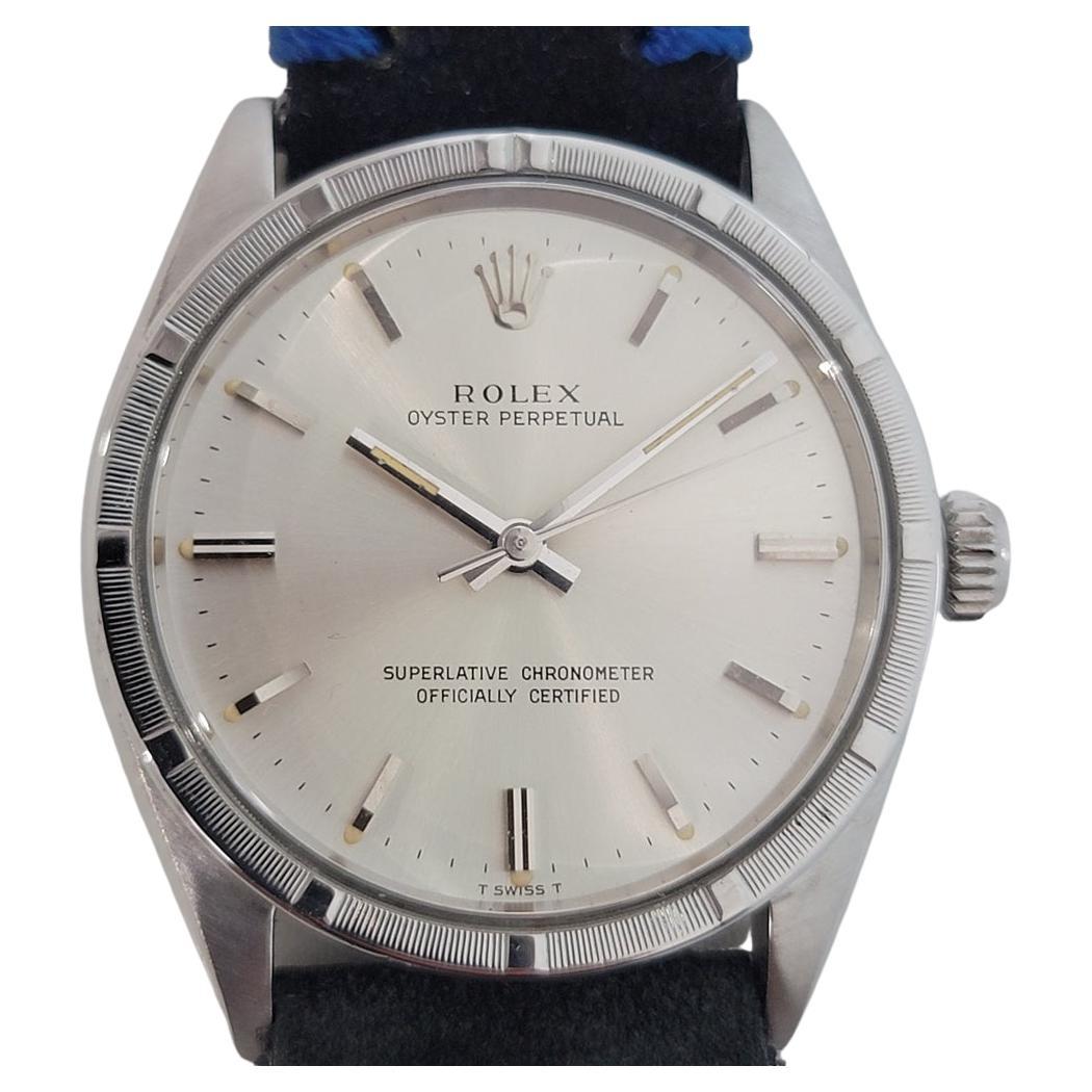 Timeless classic, Men's Rolex Ref.1007 Oyster perpetual automatic dress watch, c.1967. Verified authentic by a master watchmaker. Gorgeous Rolex signed silver dial, applied indice hour markers, silver minute and hour hands, sweeping central second