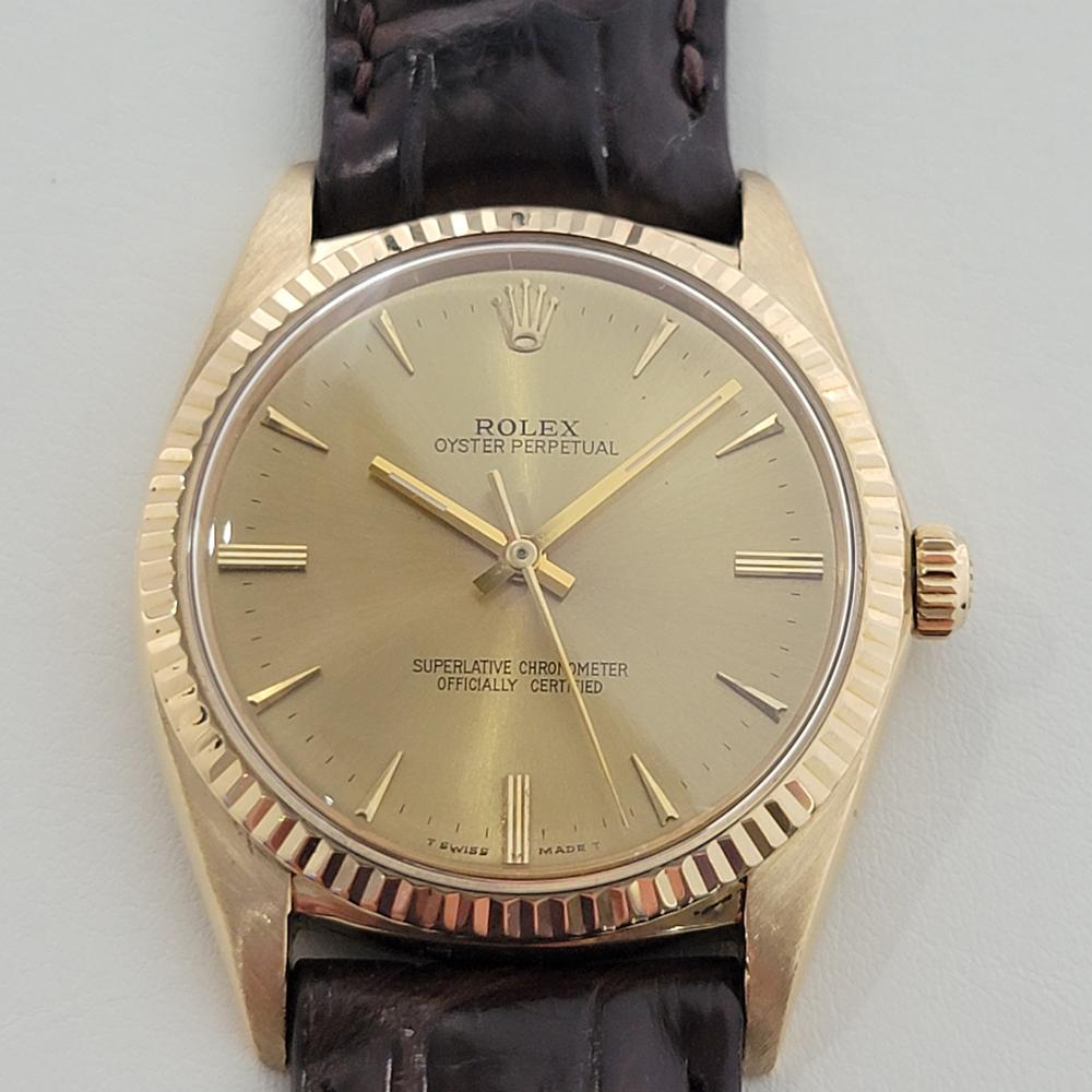 Luxurious classic, Men's solid 18k gold Rolex ref.1015 Oyster Perpetual automatic dress watch, c.1965. Verified authentic by a master watchmaker. Gorgeous Rolex signed gold dial, applied indice markers, gilt minute and hour hands, sweeping central