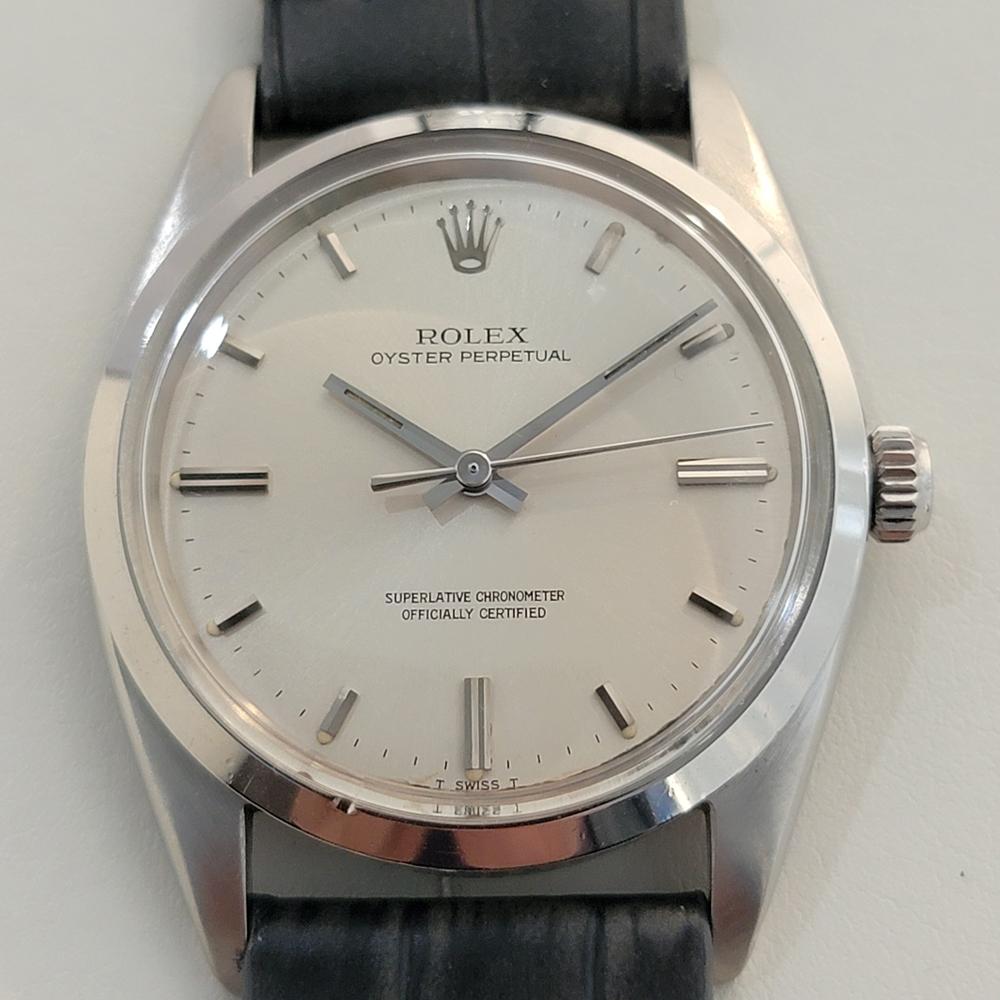 A rare vintage classic, Men's Rolex Ref.1018 Oyster perpetual automatic dress watch, c.1966, in excellent working condition. Verified authentic by a master watchmaker. Gorgeous Rolex signed silver dial, applied baton index hour markers, silver