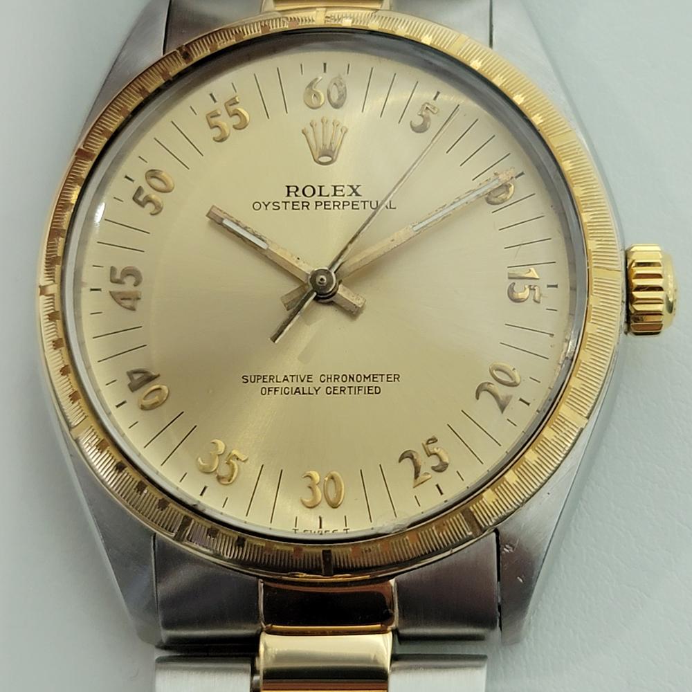 Timeless icon, Men's Rolex Oyster Perpetual ref.1038 18k gold & stainless steel automatic, c.1987, all original. Verified authentic by a master watchmaker. Gorgeous rare Rolex signed gold race dial, no-hour markers, applied Arabic numeral minute